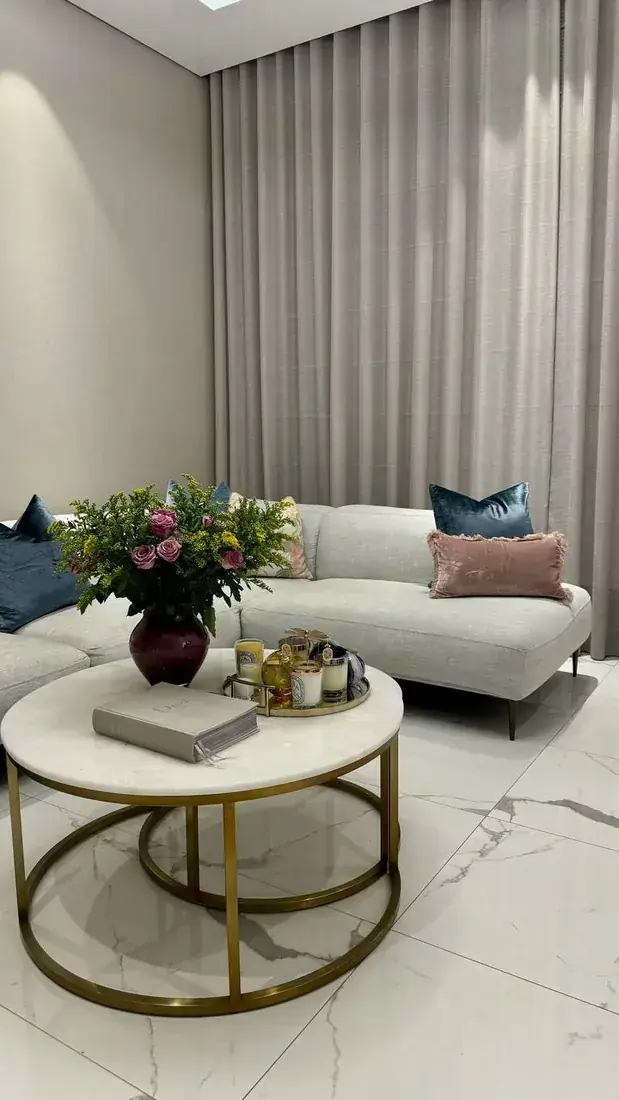 Living room with sofa and drapery